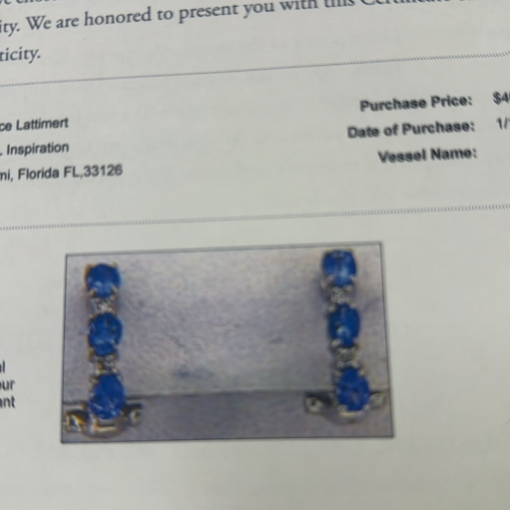 14k white gold and tanzanite earrings approx 1.20 carats
